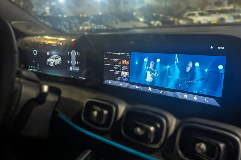 Music player displayed on a compact Driver Settings App infotainment screen